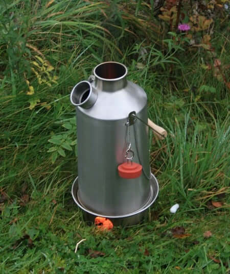 Kelly Kettle Scout 1.2L stainless steel camping kettle with carry bag and whistle outdoors
